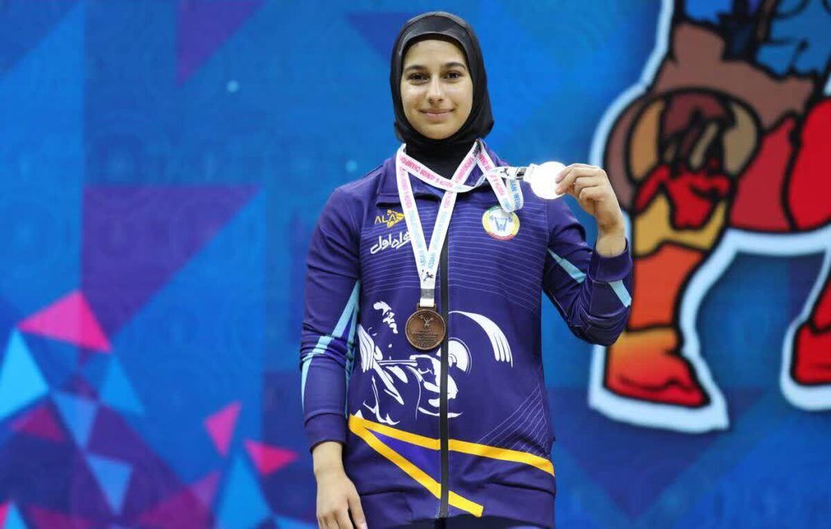 عکس ریحانه کریمی وزنه‌بردار